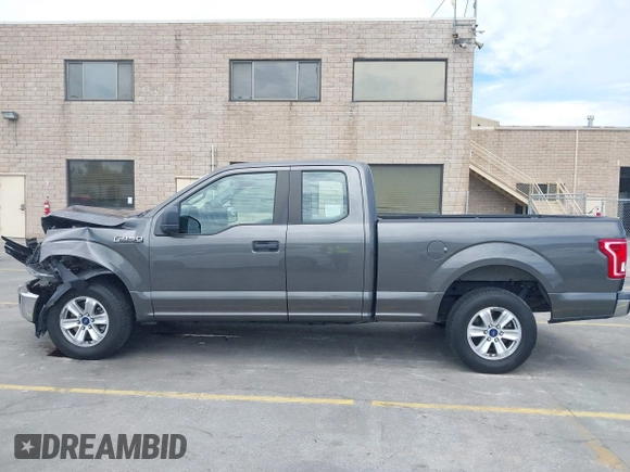 2015 Ford F-150 XL with VIN 1FTEX1CF7FKE65881, listed as a IAAI auction lot 42809438 with 122,541 mi miles and . Bid and sale history available at DreamBid. Image 14.