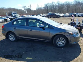 2012 Honda Civic LX z VIN 19XFB2F52CE329264, wystawiony jako IAAI lot #41654894 z przebiegiem 110 836 mil mil oraz . Historia ofert i sprzedaży dostępna na DreamBid. Obrazek 13.