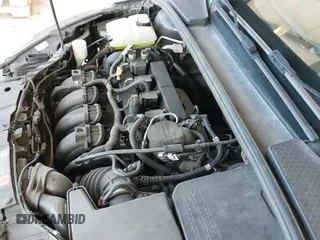 2015 Ford Focus SE z VIN 1FADP3K2XFL306875, wystawiony jako IAAI lot #43368410 z przebiegiem 220 758 mil mil oraz . Historia ofert i sprzedaży dostępna na DreamBid. Obrazek 19.