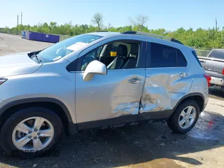 2020 Chevrolet Trax LT with VIN KL7CJLSBXLB039596, listed as a IAAI auction lot 41986195 with 25,538 mi miles and . Bid and sale history available at DreamBid. Image 14.