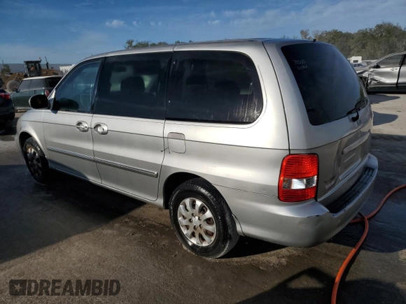 2005 Kia Sedona LX with VIN KNDUP132356769452, listed as a Copart auction lot 82835494 with 93,845 mi miles and Salvage Title. Bid and sale history available at carsss.com. Image 2.