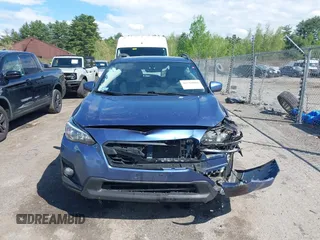 2018 Subaru Crosstrek Premium z VIN JF2GTABC1JH235675, wystawiony jako IAAI lot #42218004 z przebiegiem 152 259 mil mil oraz . Historia ofert i sprzedaży dostępna na DreamBid. Obrazek 12.