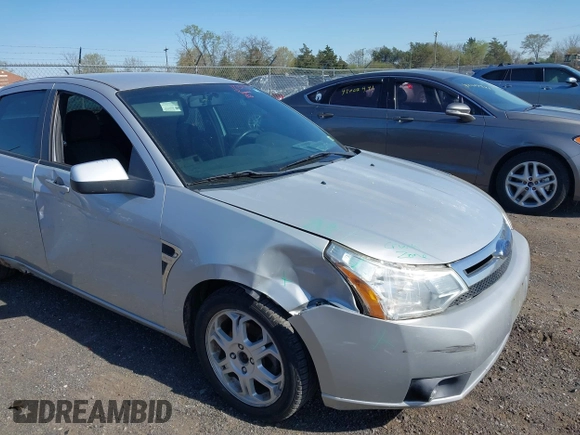 2008 Ford Focus SE with VIN 1FAHP35N48W243314, listed as a IAAI auction lot 42001321 with 210,639 mi miles. Bid and sale history available at carsss.com. Image 6.