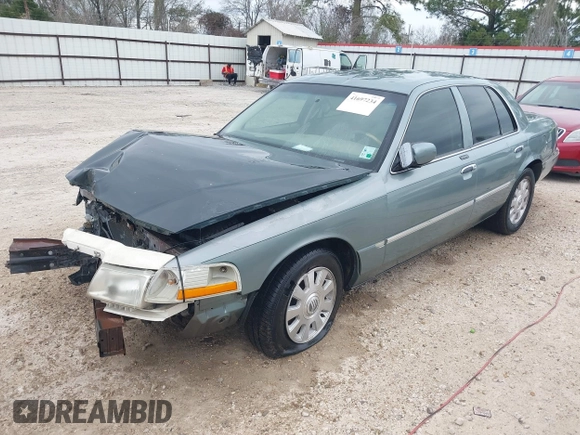 2005 Mercury Grand Marquis LS Premium z VIN 2MEHM75W45X662040, wystawiony jako IAAI lot #41697234 z przebiegiem 214 410 mil mil oraz . Historia ofert i sprzedaży dostępna na DreamBid. Obrazek 2.