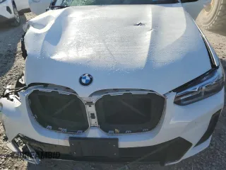 2023 BMW X4 M40i with VIN 5UX43DT05P9N61777, listed as a Copart auction lot 77600264 with 0 mi miles and Salvage Title. Bid and sale history available at carsss.com. Image 12.
