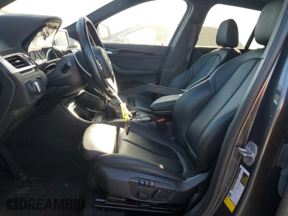 2017 BMW X1 sDrive28i with VIN WBXHU7C3XH5H36874, listed as a Copart auction lot 50607235 with 100,458 mi miles and Clean Title. Bid and sale history available at carsss.com. Image 7.