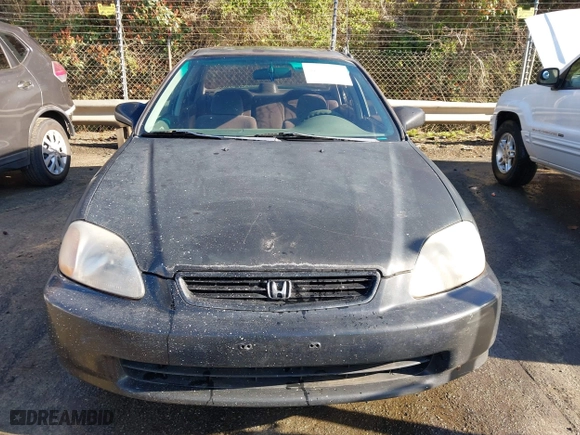 1997 Honda Civic EX with VIN 2HGEJ8645VH566736, listed as a IAAI auction lot 41876647 with 277,968 mi miles. Bid and sale history available at carsss.com. Image 12.