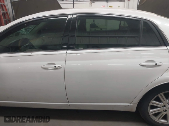 2005 Toyota Avalon XL with VIN 4T1BK36B55U013349, listed as a IAAI auction lot 41879384 with 185,821 mi miles and . Bid and sale history available at DreamBid. Image 14.