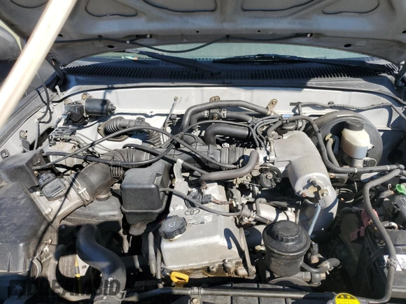 2003 Toyota Tacoma PreRunner z VIN 5TEGM92N43Z281269, wystawiony jako Copart lot #77200284 z przebiegiem 279 039 mil mil oraz Szkoda całkowita • Salvage title. Historia ofert i sprzedaży dostępna na DreamBid. Obrazek 11.