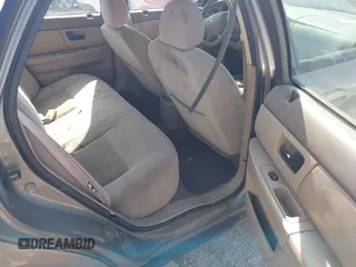 2003 Ford Taurus SE Standard z VIN 1FAFP53UX3A228383, wystawiony jako IAAI lot #42700752 z przebiegiem 182 598 mil mil oraz . Historia ofert i sprzedaży dostępna na DreamBid. Obrazek 8.