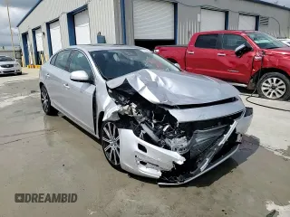 2017 Volvo S60 Inscription Platinum z VIN LYV402HMXHB129950, wystawiony jako Copart lot #54382365 z przebiegiem 92 868 mil mil oraz Szkoda całkowita • Salvage title. Historia ofert i sprzedaży dostępna na DreamBid. Obrazek 13.
