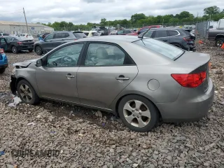 2010 Kia Forte EX z VIN KNAFU4A2XA5250756, wystawiony jako Copart lot #58743405 z przebiegiem 204 266 mil mil oraz Szkoda całkowita • Salvage title. Historia ofert i sprzedaży dostępna na DreamBid. Obrazek 2.