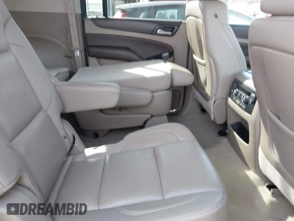 2015 Chevrolet Suburban LTZ with VIN 1GNSCKKC2FR741040, listed as a IAAI auction lot 41709574 with 87,795 mi miles and . Bid and sale history available at DreamBid. Image 8.