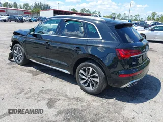 2023 Audi Q5 S line Premium Plus z VIN WA1EAAFY6P2168594, wystawiony jako IAAI lot #41863196 z przebiegiem 16 310 mil mil oraz . Historia ofert i sprzedaży dostępna na DreamBid. Obrazek 3.