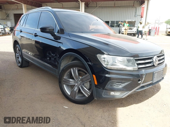 2020 Volkswagen Tiguan SE z VIN 3VV3B7AX7LM039084, wystawiony jako IAAI lot #42249016 z przebiegiem 126 763 mil mil oraz . Historia ofert i sprzedaży dostępna na DreamBid. Obrazek 1.