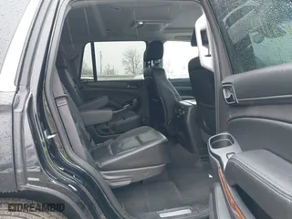 2016 Chevrolet Tahoe LTZ with VIN 1GNSKCKC2GR104305, listed as a IAAI auction lot 41697868 with 124,670 mi miles. Bid and sale history available at carsss.com. Image 8.