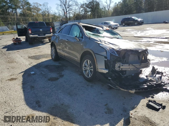 2022 Cadillac XT5 FWD Premium Luxury z VIN 1GYKNCRS8NZ112882, wystawiony jako Copart lot #86999544 z przebiegiem Nie podano mil oraz Szkoda całkowita • Salvage title. Historia ofert i sprzedaży dostępna na DreamBid. Obrazek 4.