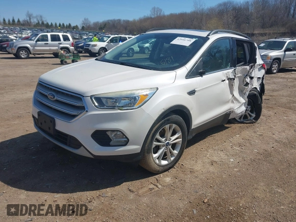 2018 Ford Escape SE z VIN 1FMCU9GD4JUB06181, wystawiony jako IAAI lot #42046708 z przebiegiem 160 987 mil mil oraz . Historia ofert i sprzedaży dostępna na DreamBid. Obrazek 18.
