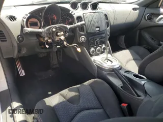 2012 Nissan 370Z z VIN JN1AZ4EH1CM562134, wystawiony jako Copart lot #56708065 z przebiegiem Nie podano mil oraz Szkoda całkowita • Salvage title. Historia ofert i sprzedaży dostępna na DreamBid. Obrazek 8.