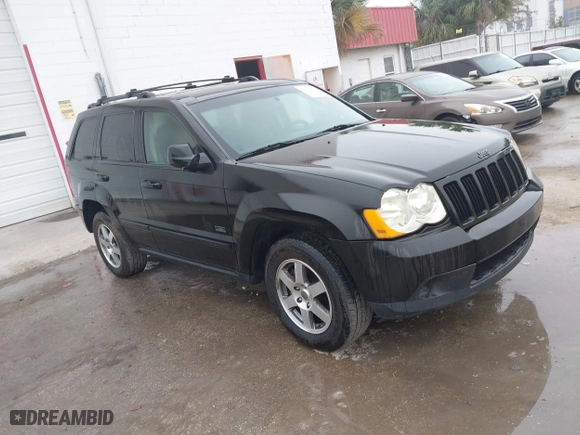 2009 Jeep Grand Cherokee Laredo with VIN 1J8GS48K39C549136, listed as a IAAI auction lot 41446925 with 162,639 mi miles. Bid and sale history available at carsss.com. Image 1.
