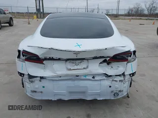 2021 Tesla Model S Plaid z VIN 5YJSA1E64MF452744, wystawiony jako IAAI lot #41375136 z przebiegiem Nie podano mil oraz . Historia ofert i sprzedaży dostępna na DreamBid. Obrazek 6.