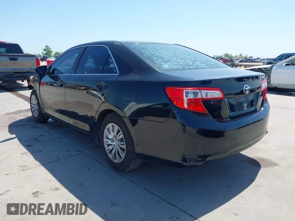 2013 Toyota Camry L with VIN 4T4BF1FK1DR308848, listed as a IAAI auction lot 42014028 with 192,645 mi miles. Bid and sale history available at carsss.com. Image 3.