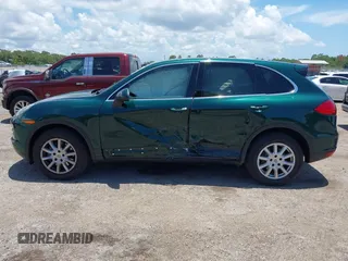 2014 Porsche Cayenne with VIN WP1AA2A21ELA06570, listed as a IAAI auction lot 42473298 with 61,421 mi miles and . Bid and sale history available at DreamBid. Image 15.