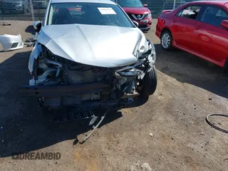 2018 Nissan Sentra S with VIN 3N1AB7AP1JY247296, listed as a IAAI auction lot 42099910 with 102,127 mi miles and . Bid and sale history available at DreamBid. Image 6.