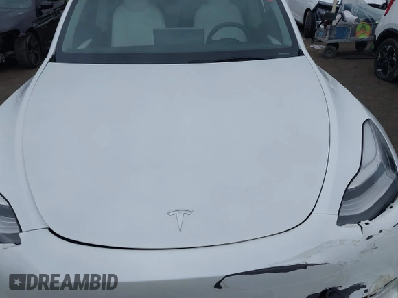 2023 Tesla Model Y Long Range with VIN 7SAYGDEE1PA106057, listed as a IAAI auction lot 41778642 with 1 mi miles. Bid and sale history available at carsss.com. Image 10.