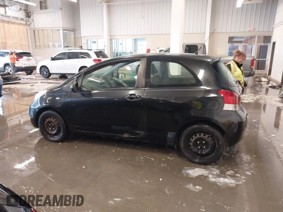 2011 Toyota Yaris with VIN JTDJT4K3XB5327229, listed as a IAAI auction lot 41275717 with 140,276 mi miles. Bid and sale history available at carsss.com. Image 14.