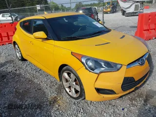 2012 Hyundai Veloster w/Gray Int with VIN KMHTC6AD2CU079902, listed as a IAAI auction lot 42088473 with 143,983 mi miles. Bid and sale history available at carsss.com. Image 1.