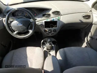 2004 Ford Focus ZX3 with VIN 3FAFP313X4R123879, listed as a Copart auction lot 54052055 with 174,692 mi miles and Salvage Title. Bid and sale history available at carsss.com. Image 8.