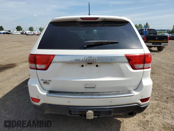 2011 Jeep Grand Cherokee Overland with VIN 1J4RR6GG3BC718723, listed as a Copart auction lot 64975275 with 272,922 mi miles and Salvage title. Bid and sale history available at DreamBid. Image 6.