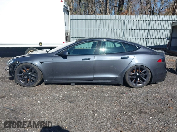2021 Tesla Model S Long Range with VIN 5YJSA1E52MF428370, listed as a IAAI auction lot 41809773 with 34,372 mi miles and . Bid and sale history available at DreamBid. Image 14.