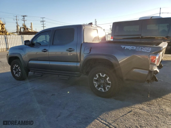 2021 Toyota Tacoma 4WD SR with VIN 3TMCZ5AN8MM453084, listed as a Copart auction lot 46718395 with 72,417 mi miles and Salvage Title. Bid and sale history available at carsss.com. Image 2.