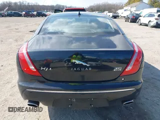 2013 Jaguar XJ Portfolio with VIN SAJWJ2GDXD8V55879, listed as a IAAI auction lot 41568366 with 121,119 mi miles and . Bid and sale history available at DreamBid. Image 16.