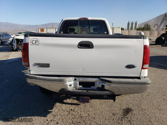 2002 Ford Super Duty F-250 XL with VIN 1FTNX20L32ED10043, listed as a Copart auction lot 82608574 with 150,324 mi miles and Salvage Title. Bid and sale history available at carsss.com. Image 6.