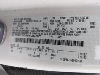2021 Ford Escape SE z VIN 1FMCU0G6XMUB32625, wystawiony jako IAAI lot #42279918 z przebiegiem 93 646 mil mil oraz . Historia ofert i sprzedaży dostępna na DreamBid. Obrazek 9.