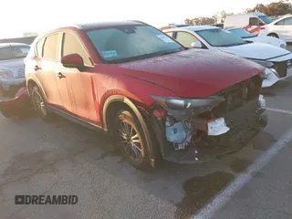 2020 Mazda CX-5 Touring z VIN JM3KFACM1L0855474, wystawiony jako IAAI lot #42004504 z przebiegiem 82 505 mil mil oraz . Historia ofert i sprzedaży dostępna na DreamBid. Obrazek 1.