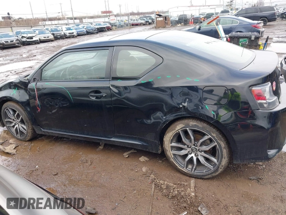 2014 Scion tC with VIN JTKJF5C74E3069104, listed as a IAAI auction lot 41579797 with 130,668 mi miles. Bid and sale history available at carsss.com. Image 14.