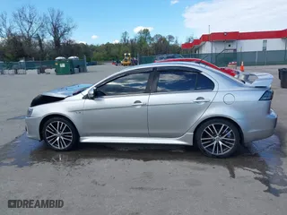 2017 Mitsubishi Lancer ES with VIN JA32V2FW9HU000485, listed as a IAAI auction lot 42019371 with 101,922 mi miles. Bid and sale history available at carsss.com. Image 14.