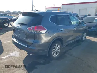 2015 Nissan Rogue SL with VIN 5N1AT2MV3FC752646, listed as a IAAI auction lot 41038720 with 74,490 mi miles and . Bid and sale history available at carsss.com. Image 4.
