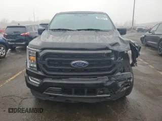 2023 Ford F-150 XL with VIN 1FTFW1ED2PFD30384, listed as a Copart auction lot 55593215 with 21,107 mi miles and Clean title. Bid and sale history available at DreamBid. Image 5.