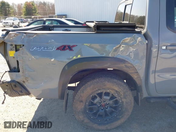 2022 Nissan Frontier SV z VIN 1N6ED1EKXNN659026, wystawiony jako IAAI lot #42050476 z przebiegiem 26 183 mil mil oraz . Historia ofert i sprzedaży dostępna na DreamBid. Obrazek 19.