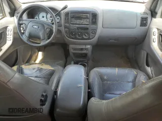 2001 Ford Escape XLT z VIN 1FMYU04111KB13287, wystawiony jako Copart lot #62183415 z przebiegiem 237 142 mil mil oraz Szkoda całkowita • Salvage title. Historia ofert i sprzedaży dostępna na DreamBid. Obrazek 8.