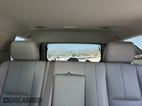 2014 Chevrolet Tahoe LT with VIN 1GNSCBE09ER118630, listed as a Copart auction lot 58906965 with 92,734 mi miles and Salvage title. Bid and sale history available at DreamBid. Image 10.