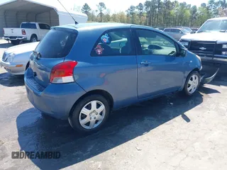 2010 Toyota Yaris with VIN JTDJT4K36A5285298, listed as a IAAI auction lot 42003609 with 158,418 mi miles. Bid and sale history available at carsss.com. Image 4.