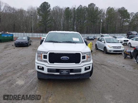 2019 Ford F-150 XL with VIN 1FTEW1CP0KKF10214, listed as a IAAI auction lot 41222565 with 76,920 mi miles and . Bid and sale history available at carsss.com. Image 12.