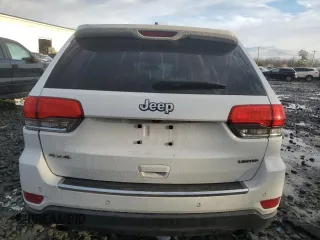 2014 Jeep Grand Cherokee Limited z VIN 1C4RJFBG8EC129868, wystawiony jako Copart lot #86781534 z przebiegiem 99 316 mil mil oraz Szkoda całkowita • Salvage title. Historia ofert i sprzedaży dostępna na DreamBid. Obrazek 6.