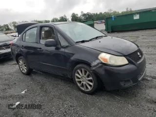 2011 Suzuki SX4 LE z VIN JS2YC5A28B6300625, wystawiony jako Copart lot #54044155 z przebiegiem 179 269 mil mil oraz Szkoda całkowita • Salvage title. Historia ofert i sprzedaży dostępna na DreamBid. Obrazek 4.